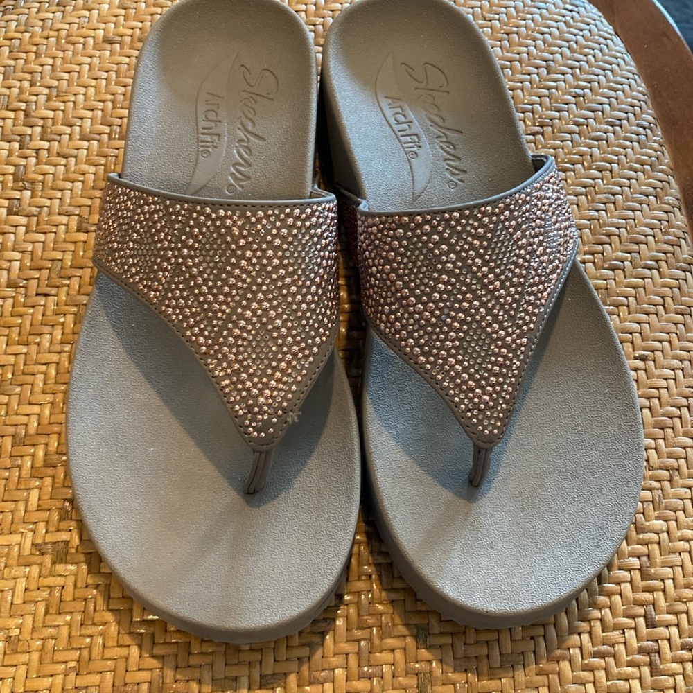 Skechers arch fit sandals.